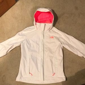 White North Face rain jacket with hot pink lining
